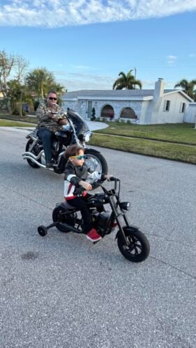 Kids Electric Motorcycle With Colorful Ambient Light photo review